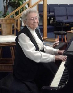 Miss Ella at the piano